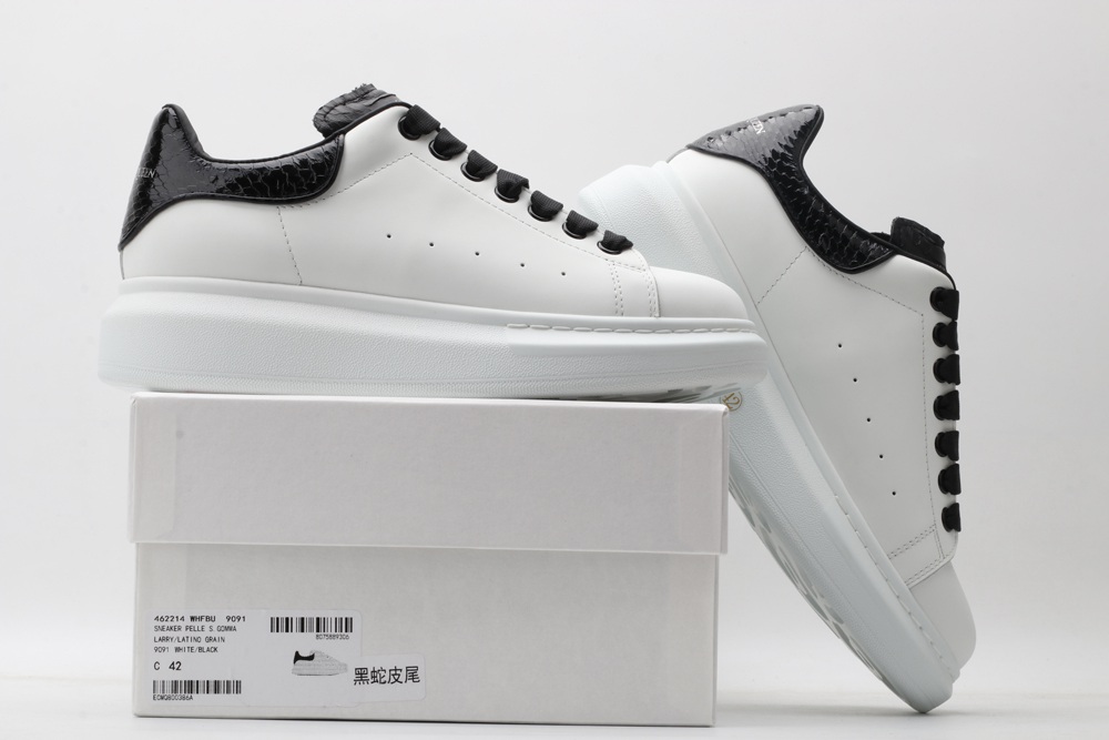 AMQ OVERSIZED SNEAKER with blue stamped python heel