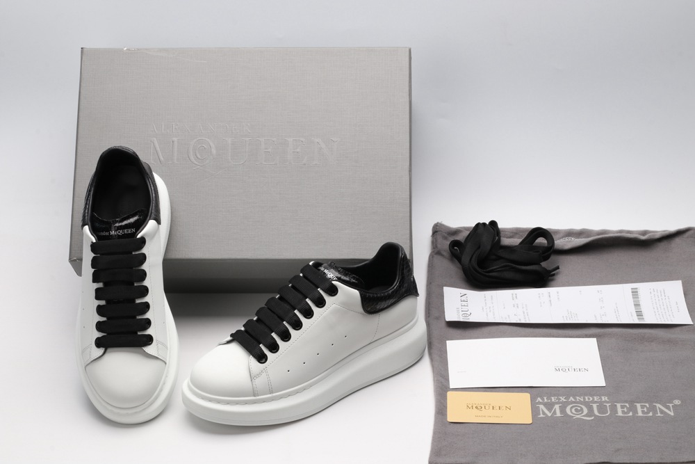 AMQ OVERSIZED SNEAKER with blue stamped python heel