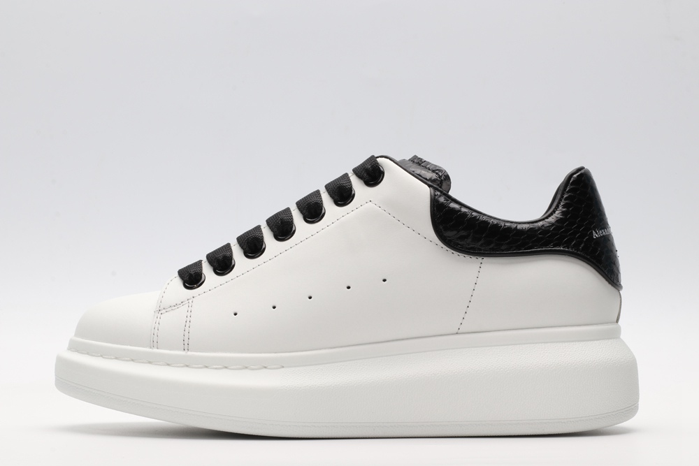 AMQ OVERSIZED SNEAKER with blue stamped python heel