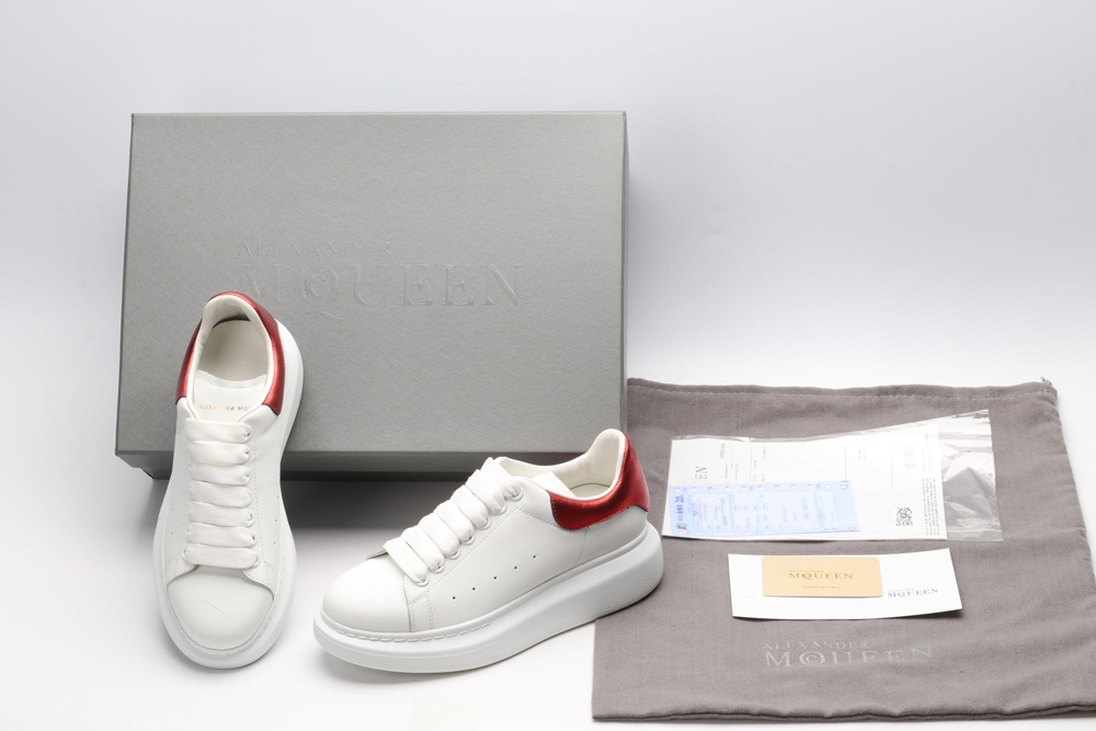 AMQ oversized sneakers with red heel