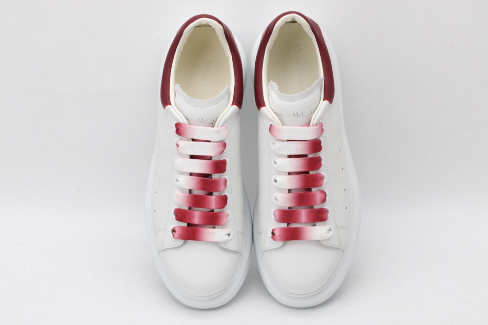 AMQ oversized sneakers with red heel