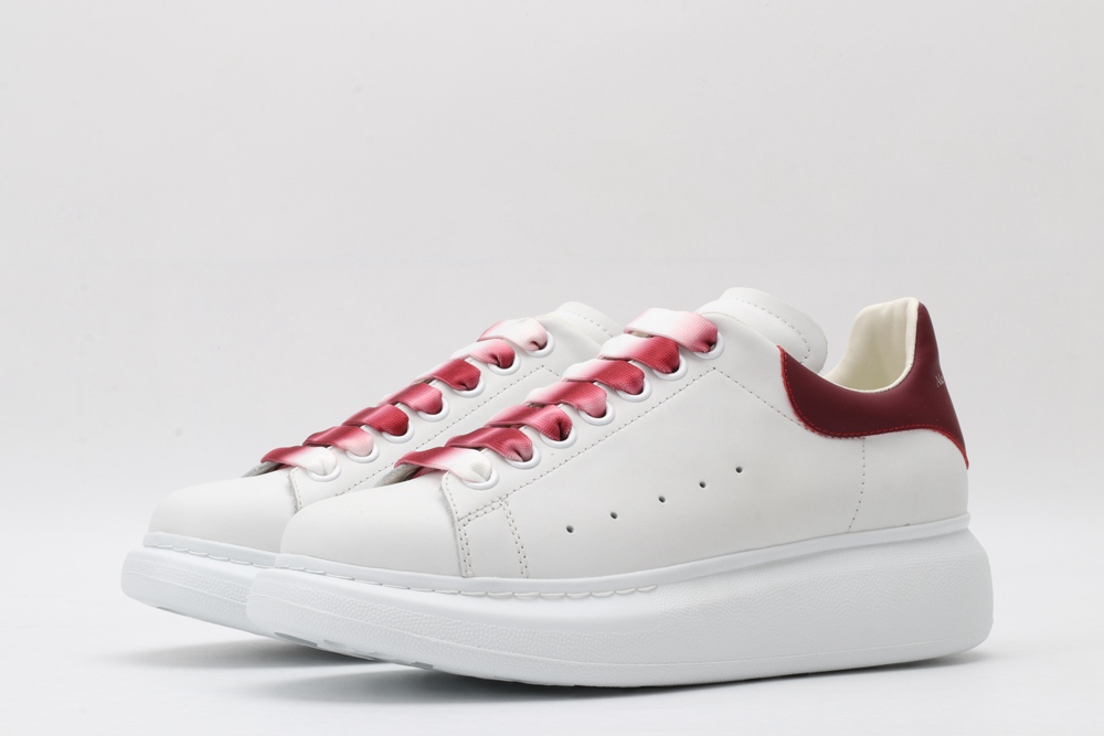 AMQ oversized sneakers with red heel