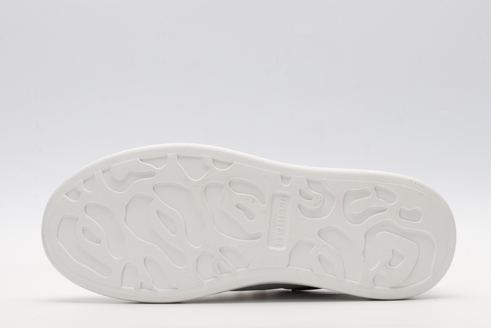 AMQ white oversized sneakers with black heel