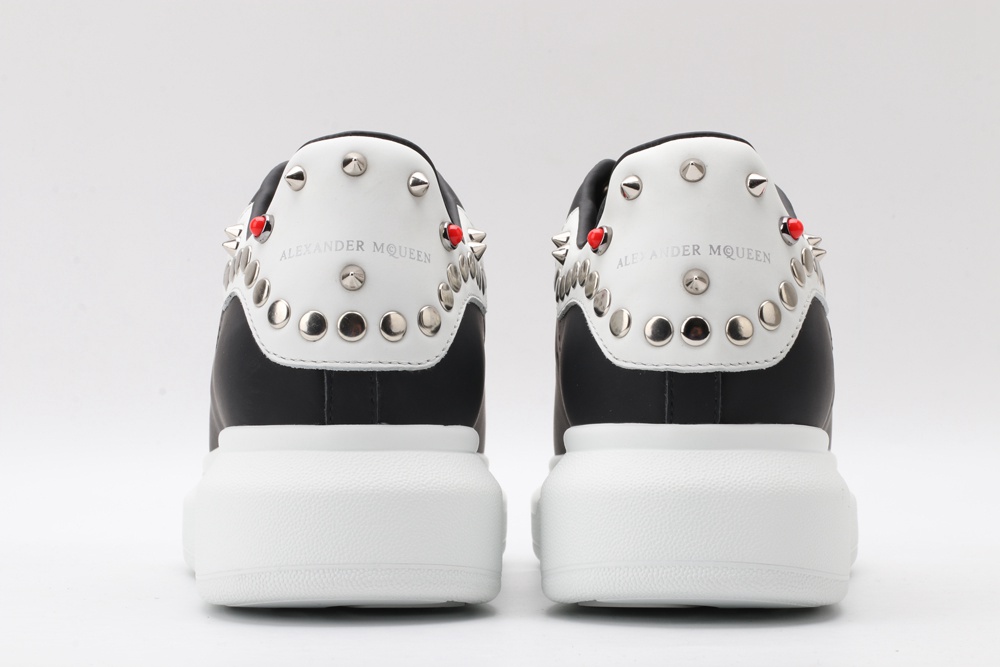 AMQ Black Studded Logo Oversized Sneakers
