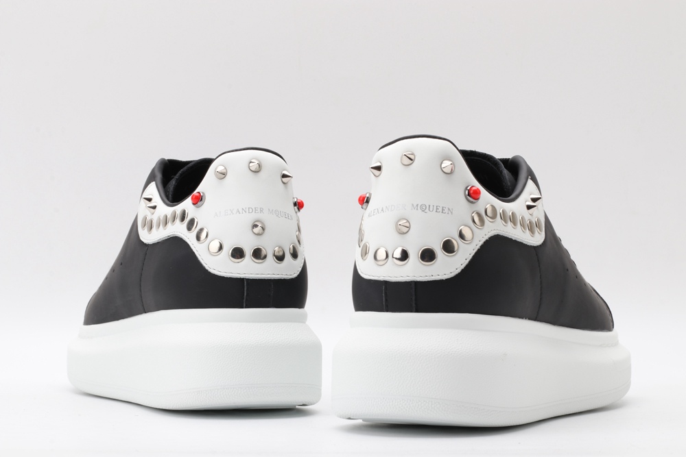 AMQ Black Studded Logo Oversized Sneakers