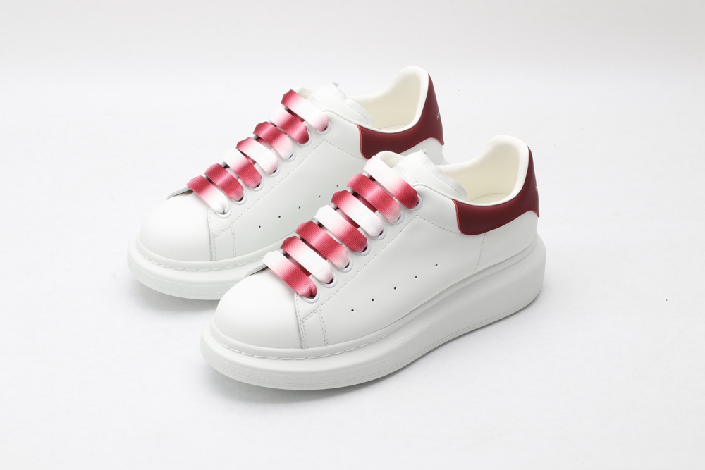 AMQ oversized sneakers with red heel