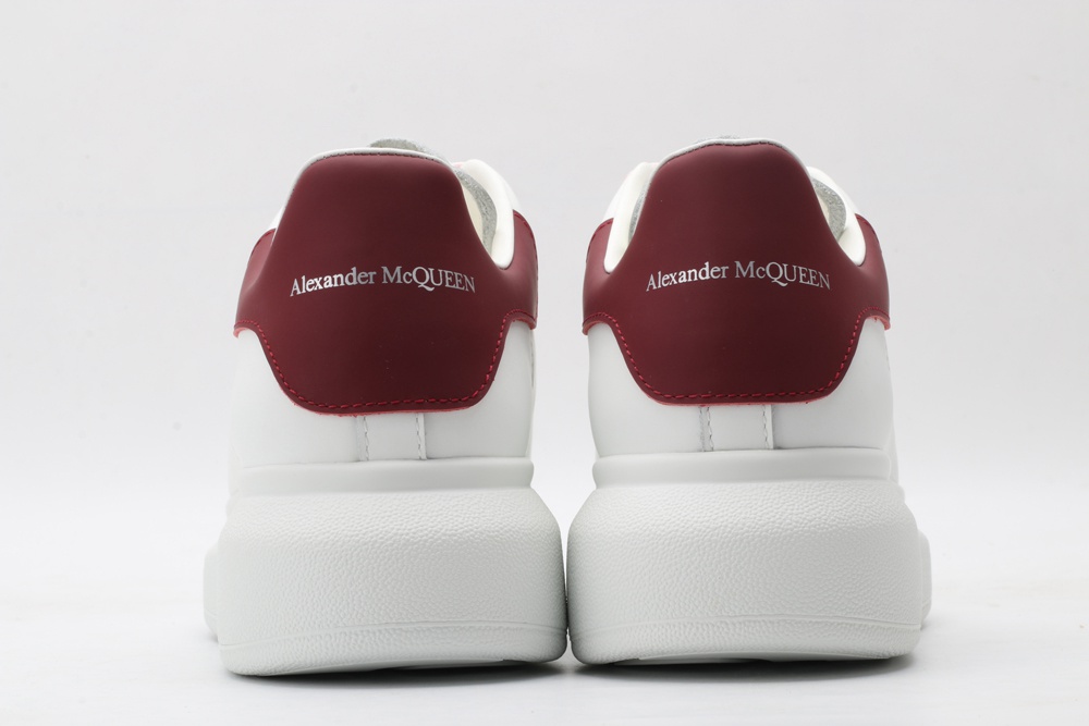 AMQ oversized sneakers with red heel